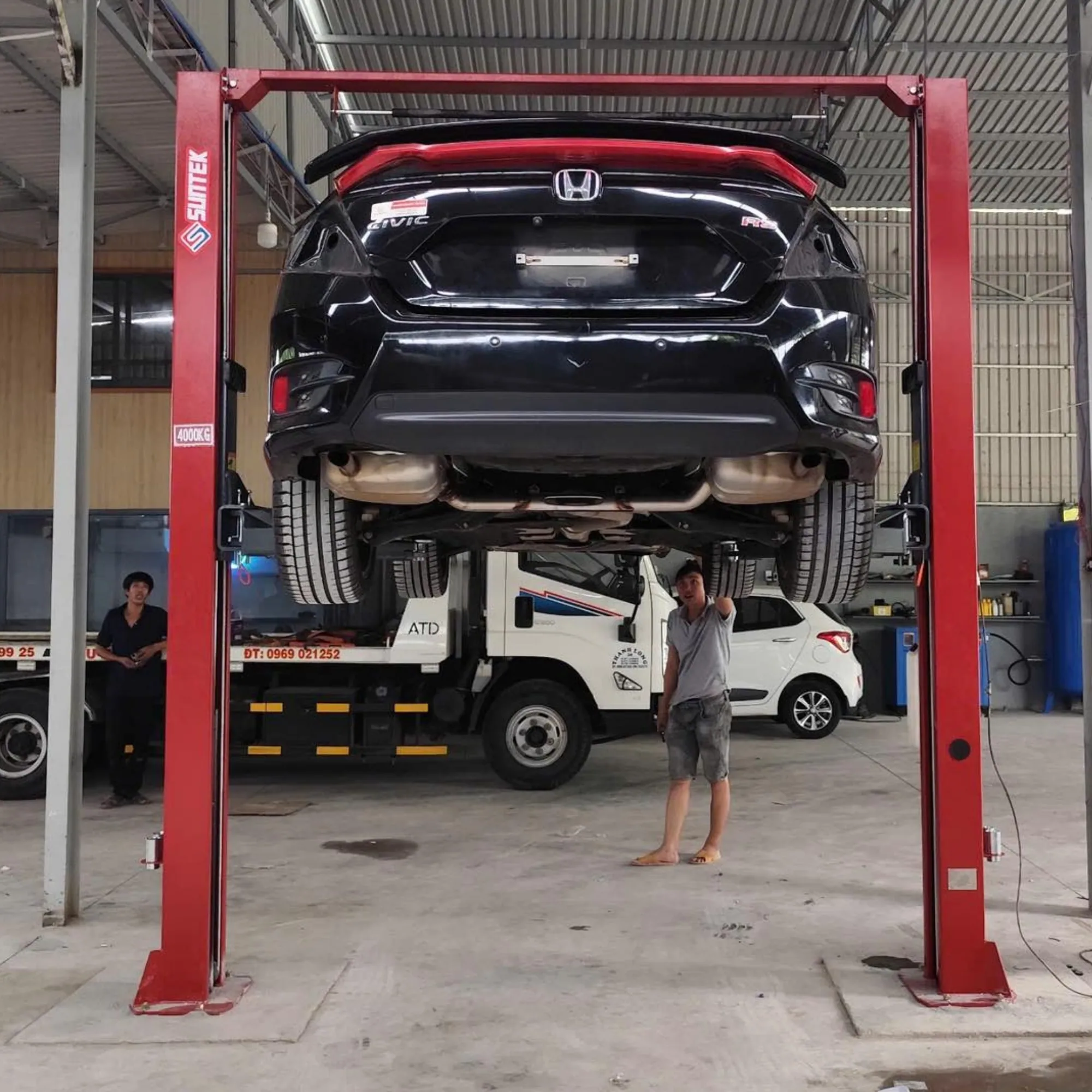 Cầu nâng SUNTEK 4000T nâng xe sedan sửa chữa gầm
