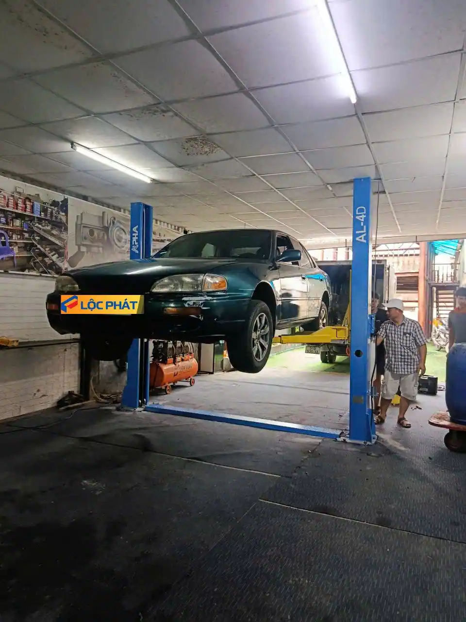 Lộc Phát bàn giao và hướng dẫn sử dụng cầu nâng cho khách hàng