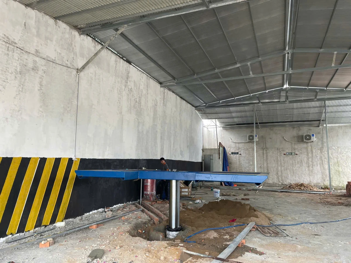 Cầu nâng 1 trụ cánh bướm A-TAM lắp đặt tại garage
