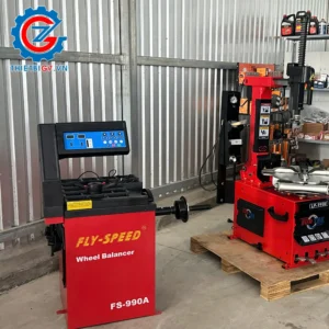 Máy cân mâm Fly Speed FS-9902 màu đỏ, thiết bị sửa chữa ô tô.