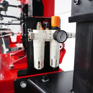 Chi tiết bộ lọc khí và bộ điều chỉnh áp suất của máy tháo vỏ SunTek LP-990E, quan trọng cho hoạt động ổn định.