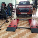 Cầu nâng cắt kéo di động SUNTEK thử tải xe bán tải Isuzu tại Bến Cát Lộc Phát