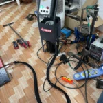 Tủ điều khiển điện thủy lực cầu nâng cắt kéo SUNTEK bọc vỏ bảo vệ dây dầu Lộc Phát